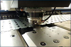 High precision CNC sheet metal stamping and punching machinery.